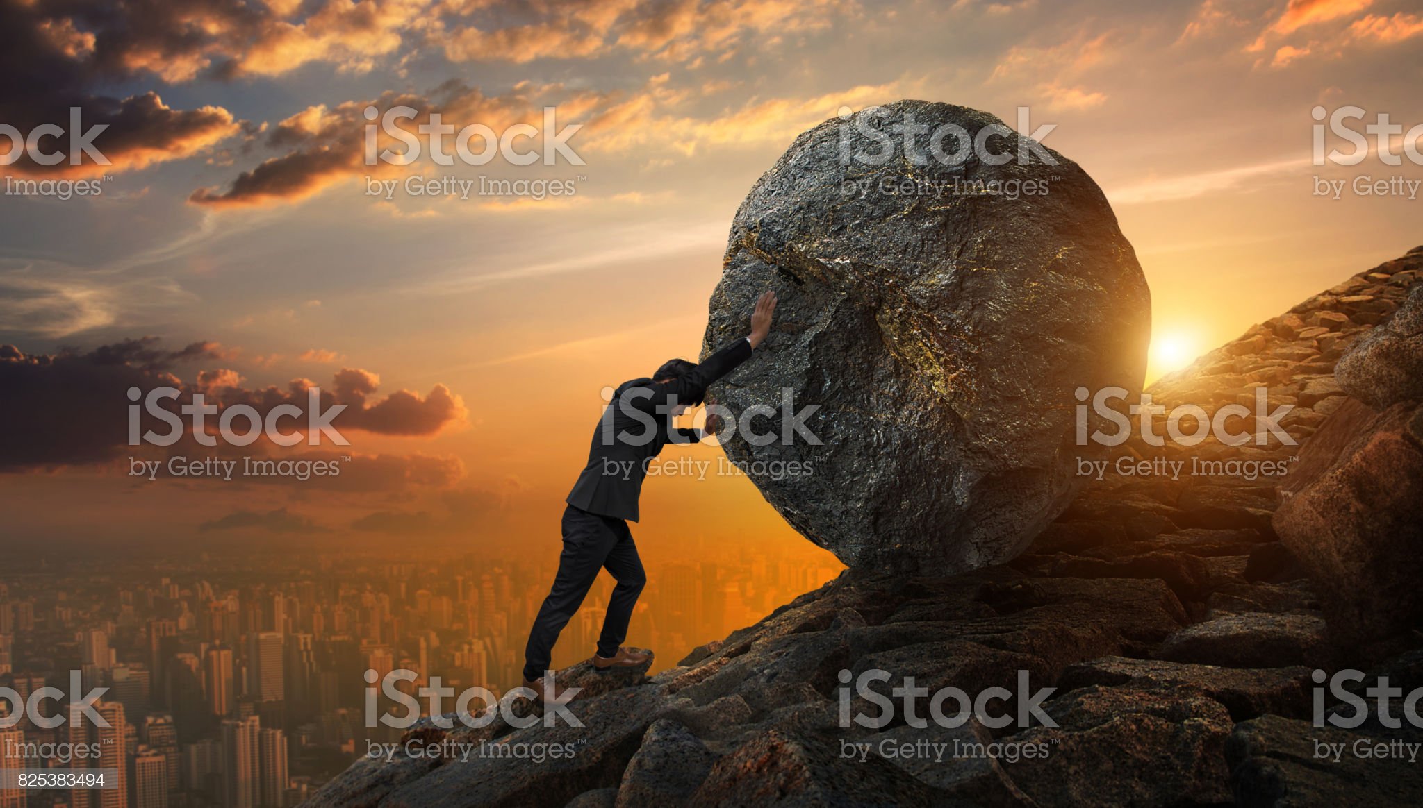 Business man pushing large stone up to hill , Business heavy tasks and problems concept. royalty-free stock photo